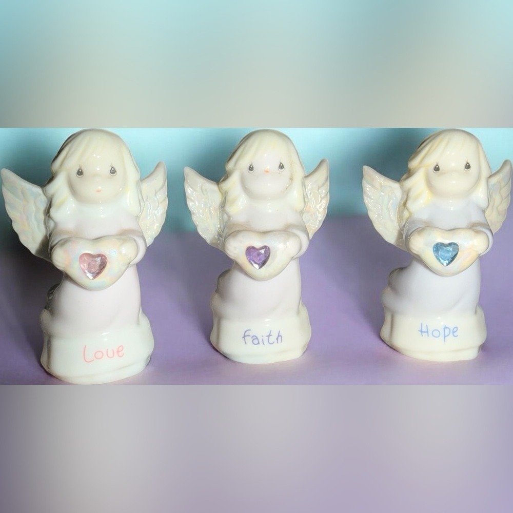 Precious Moments "Love," "Faith," and "Hope" angel figurines from 2003